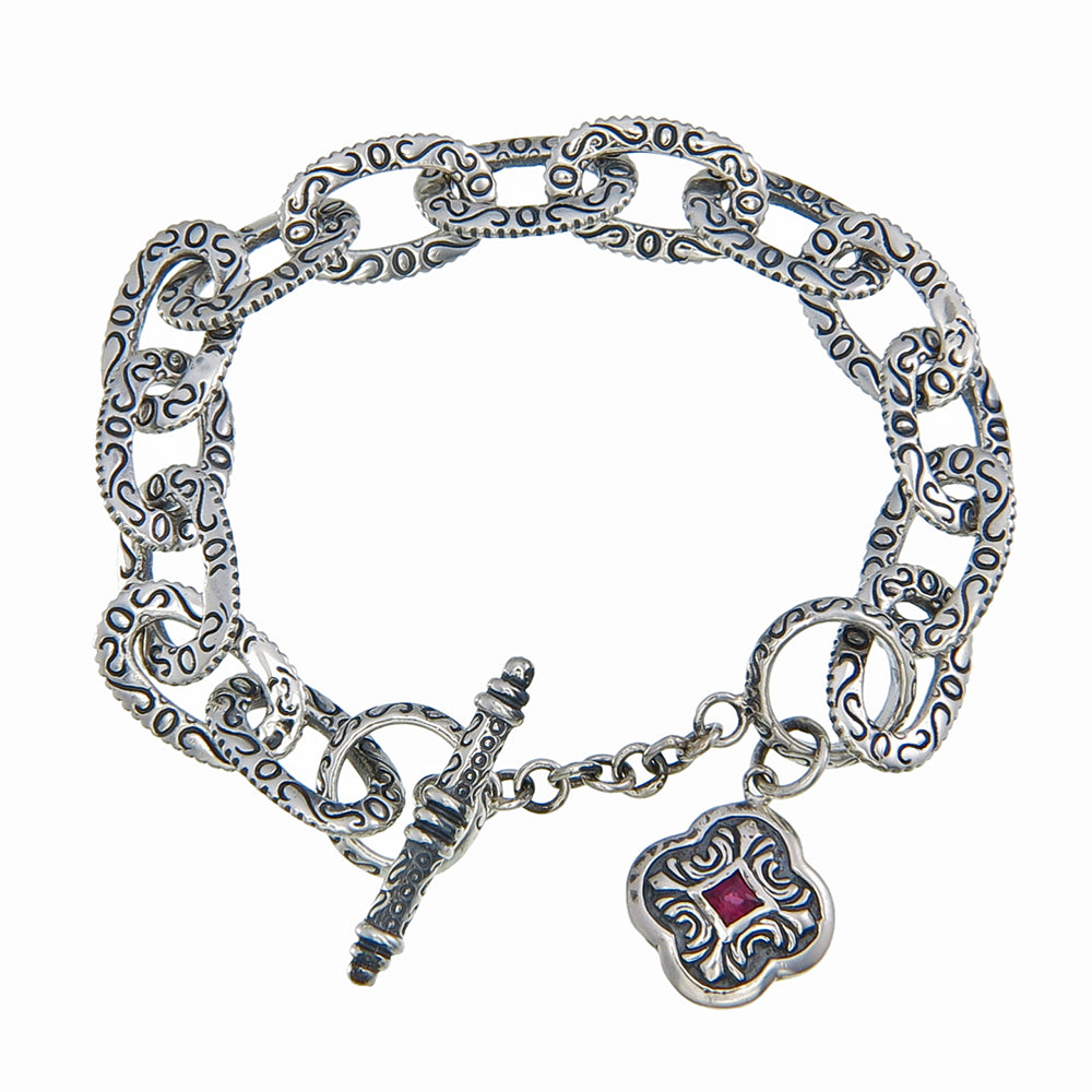 Carved Link Bracelet with Garnet Quadrefoil Accent